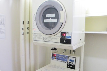 写真：コインランドリー（4F、5F、6F各1台）
