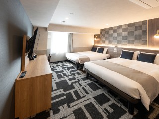 写真：全室サータ®製ベッドを導入